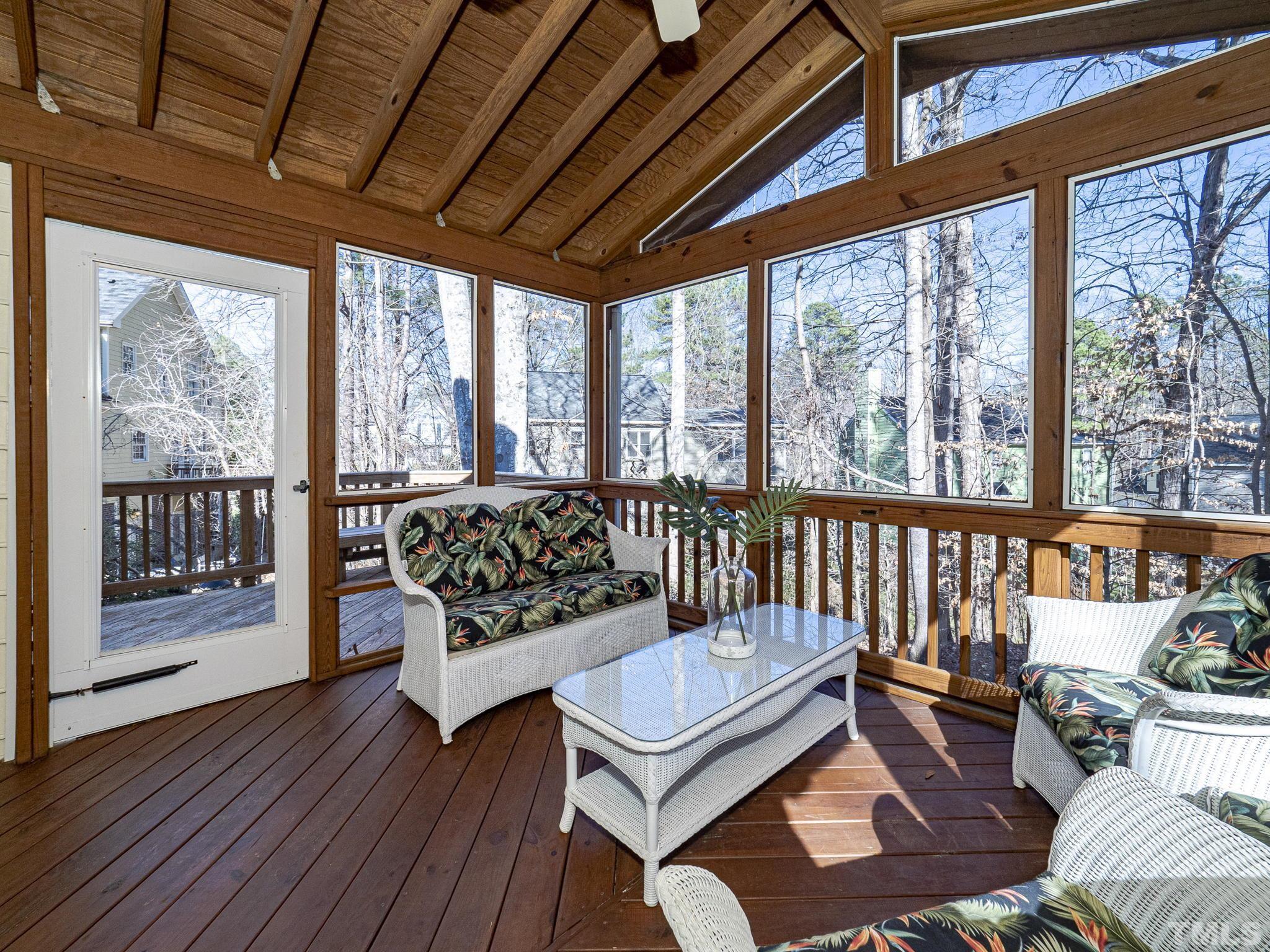 106 Kingsmill Road Cary, NC 27511 - Photo 26 of 31 a living room with furniture and a floor to ceiling window