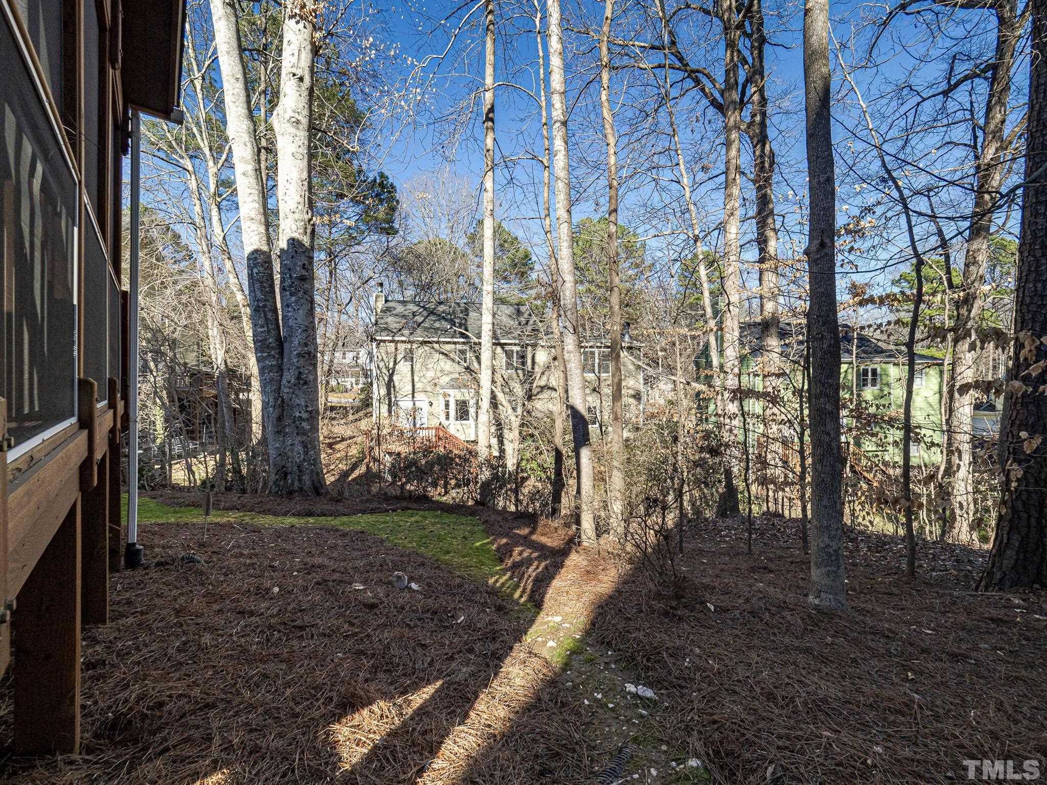 106 Kingsmill Road Cary, NC 27511 - Photo 28 of 31 a view of a yard with plants and trees