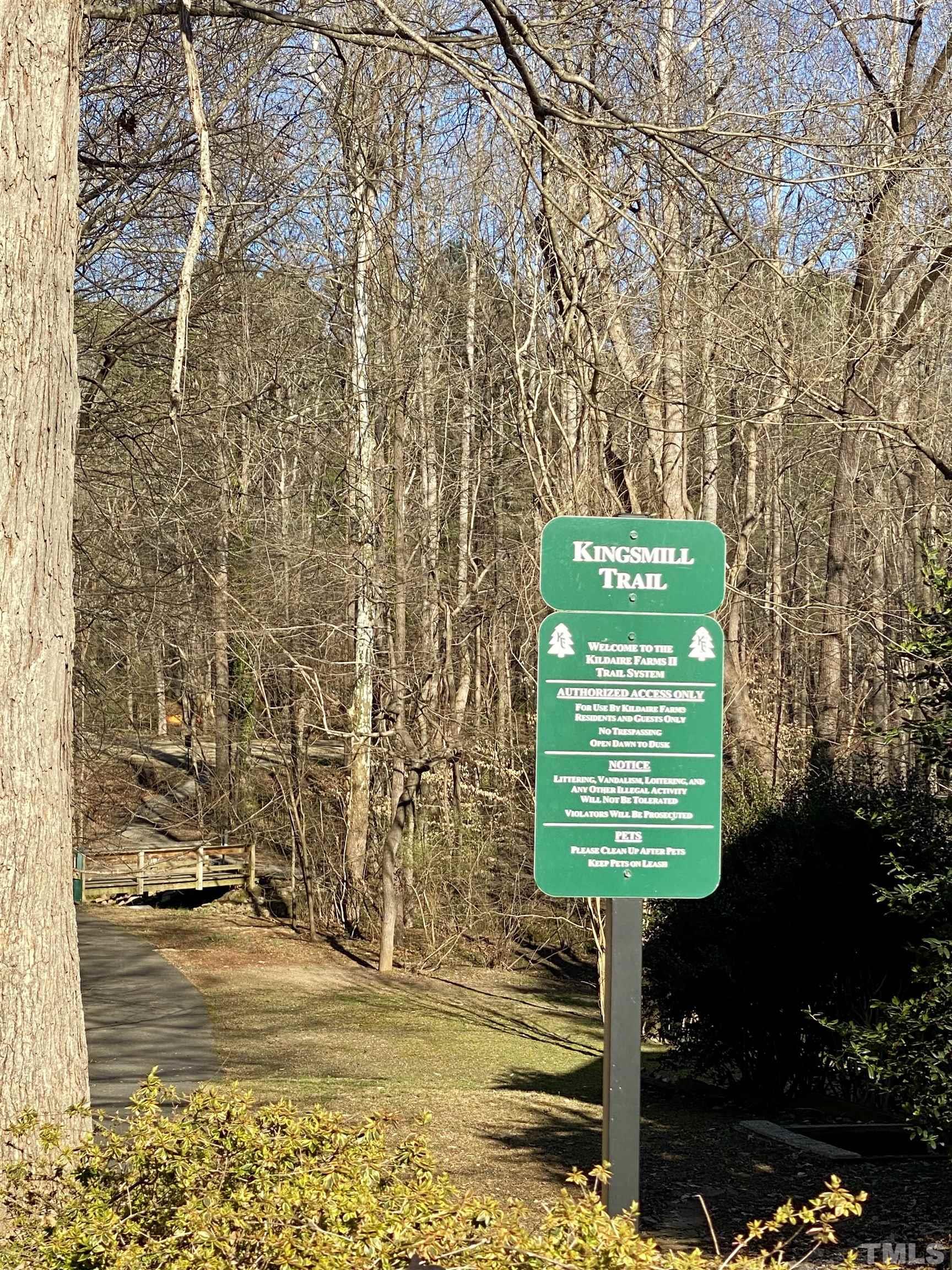 106 Kingsmill Road Cary, NC 27511 - Photo 30 of 31 a sign that is sitting on a brick wall