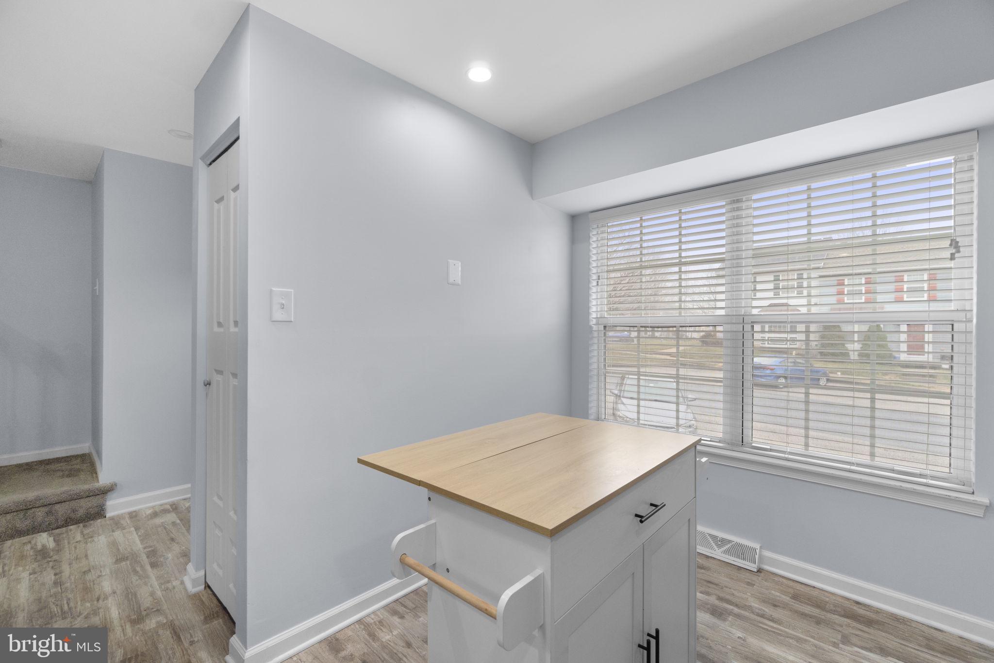 930 Gaming Square Hampstead, MD 21074 - Photo 12 of 36 a view of kitchen with a sink and wooden floor