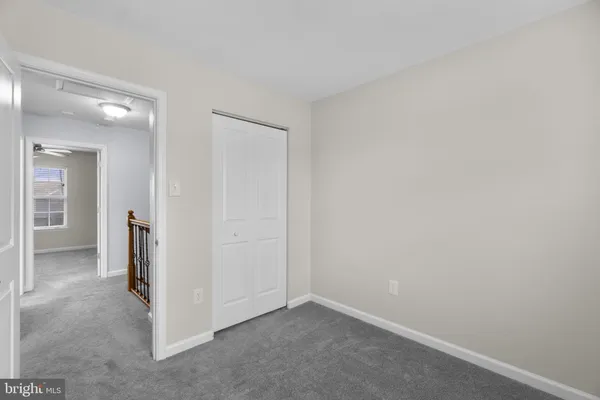 an empty room with closet