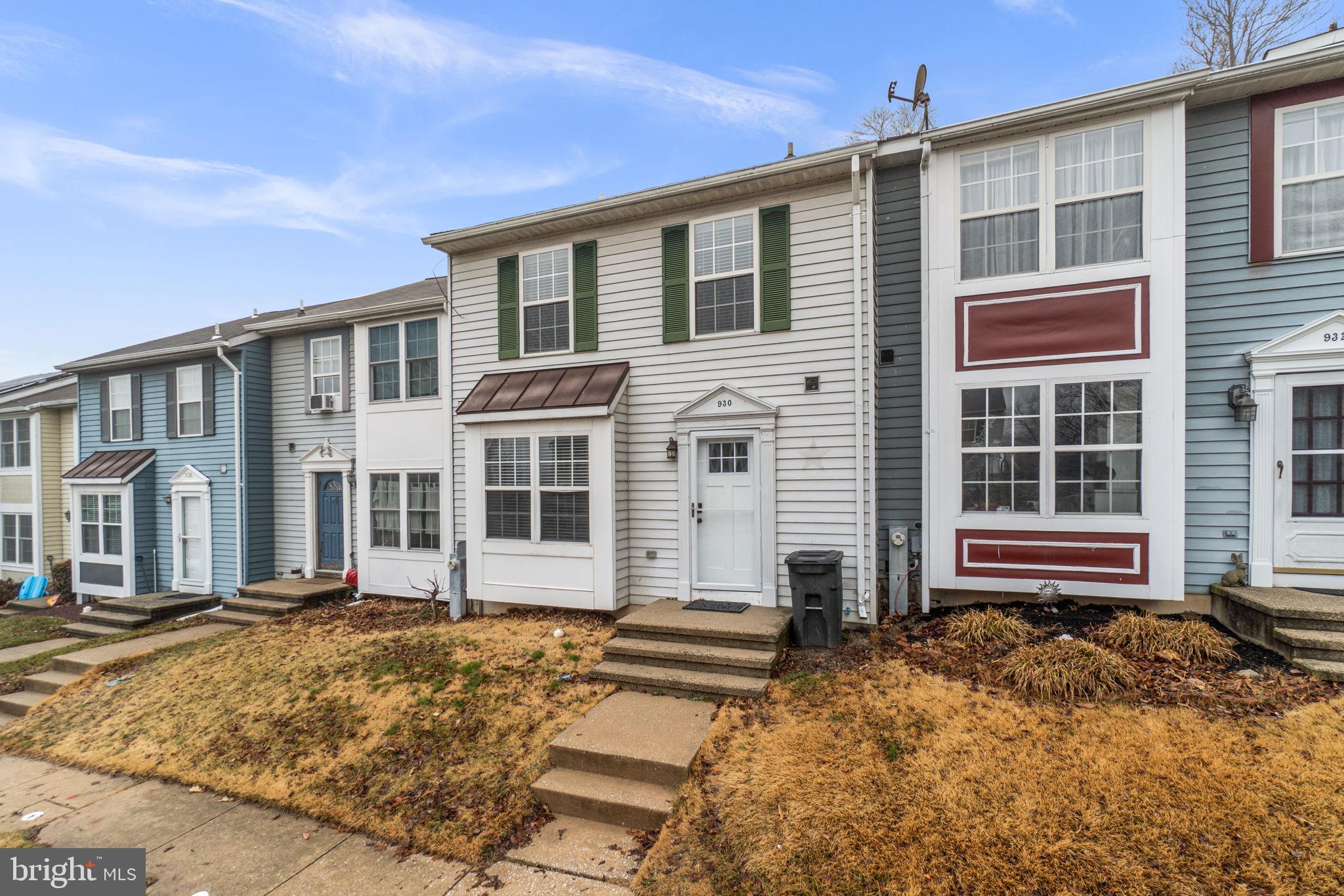 930 Gaming Square Hampstead, MD 21074 - Photo 2 of 36 a front view of a house with a yard