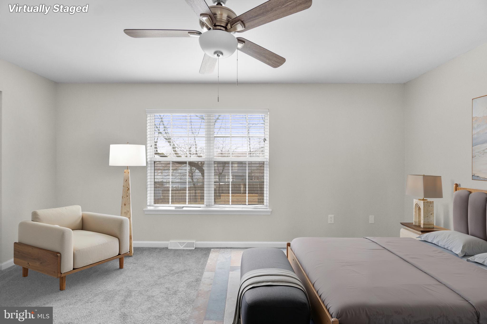 930 Gaming Square Hampstead, MD 21074 - Photo 24 of 36 a bedroom with a bed couch and window