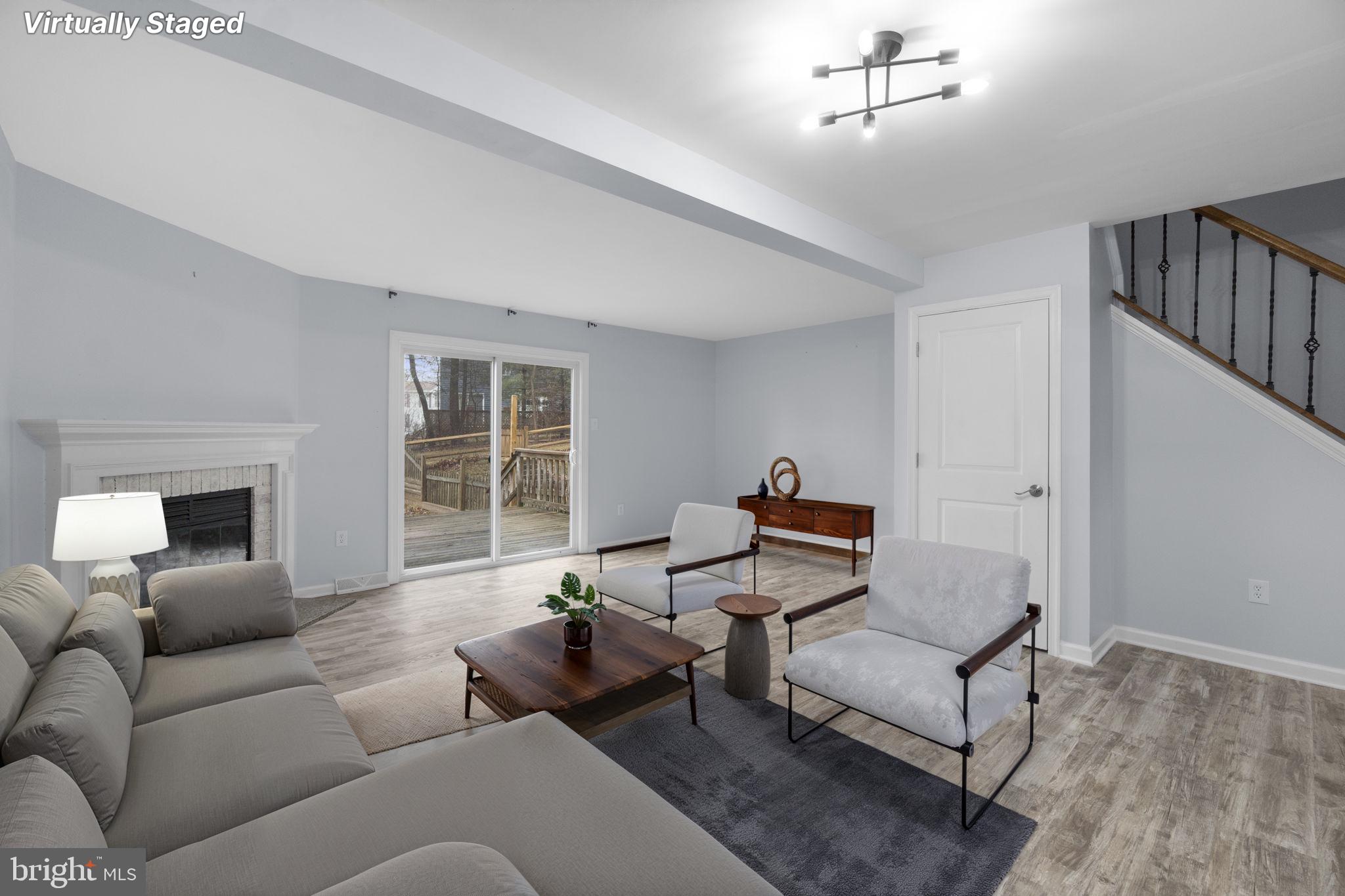 930 Gaming Square Hampstead, MD 21074 - Photo 5 of 36 a living room with furniture and a fireplace
