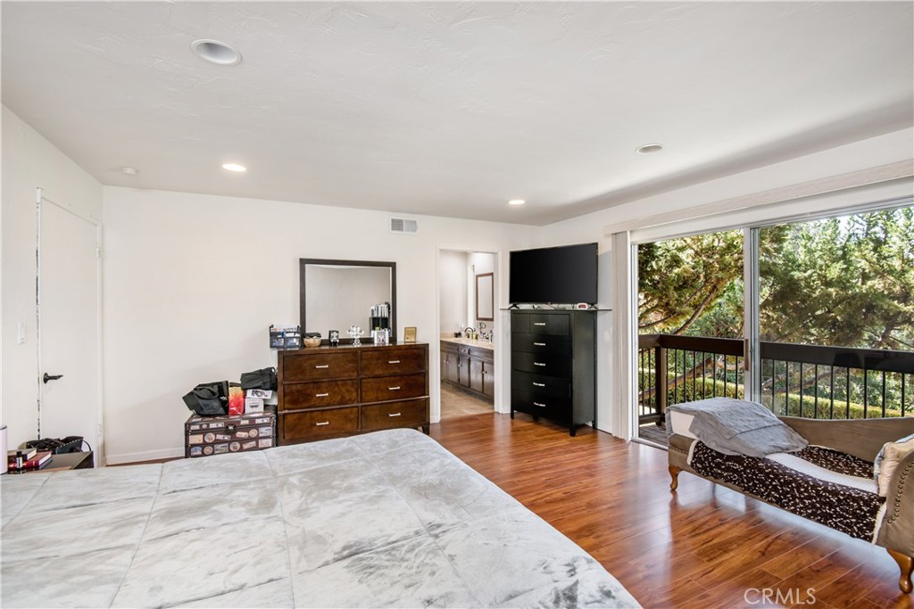 1036 Sherlock Drive Burbank, CA 91501 - Photo 17 of 28 a bedroom with furniture and a window