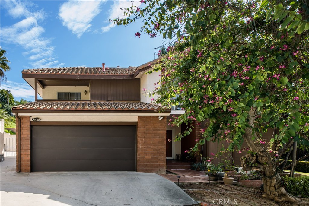 1036 Sherlock Drive Burbank, CA 91501 - Photo 28 of 28 a front view of a house with a garage