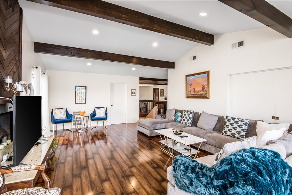 1036 Sherlock Drive Burbank, CA 91501 - Photo 5 of 28 a living room with furniture and a flat screen tv