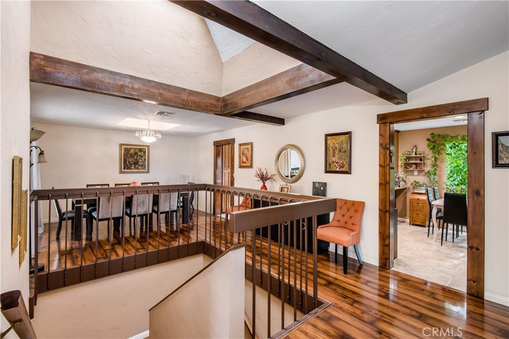 1036 Sherlock Drive Burbank, CA 91501 - Photo 6 of 28 a view of a hallway with wooden floor and windows