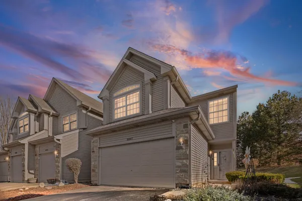 front view of a house with a street