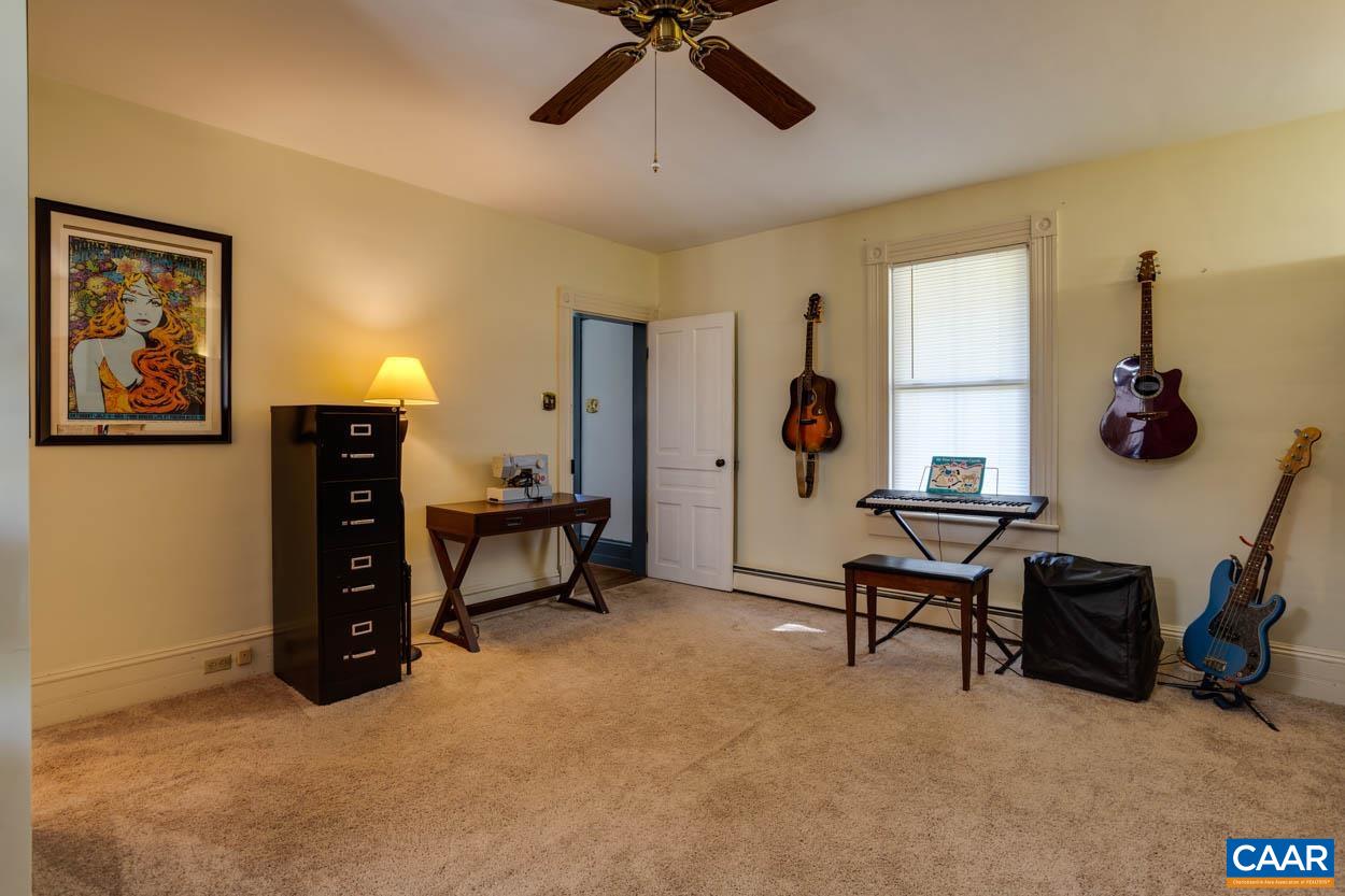 5407 South Blue Ridge Turnpike Rochelle, VA 22738 - Photo 11 of 72 a view of a livingroom with workspace and a window