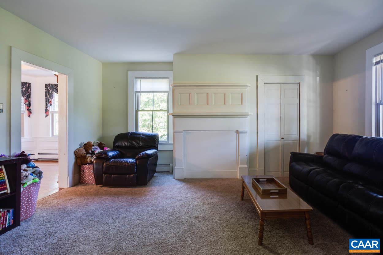 5407 South Blue Ridge Turnpike Rochelle, VA 22738 - Photo 15 of 72 a living room with furniture and a window