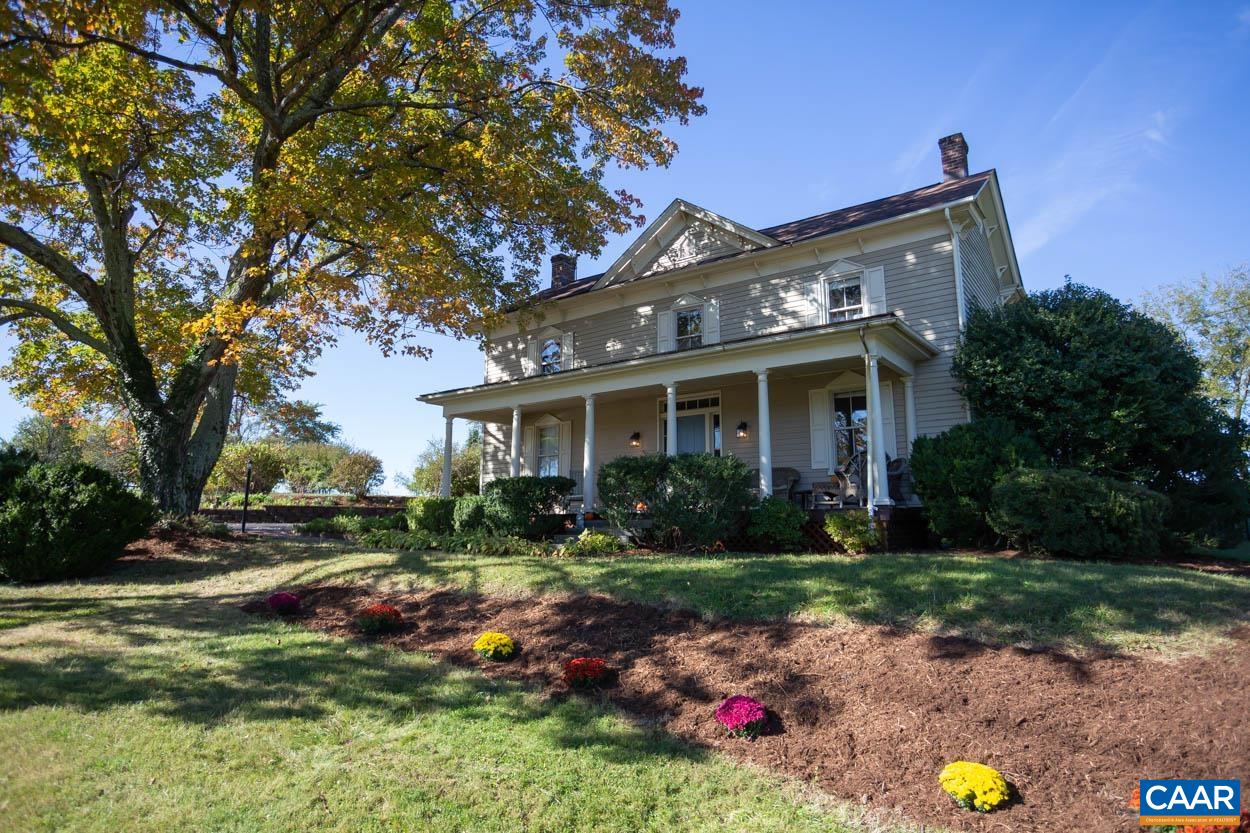 5407 South Blue Ridge Turnpike Rochelle, VA 22738 - Photo 2 of 72 a front view of house with yard and green space