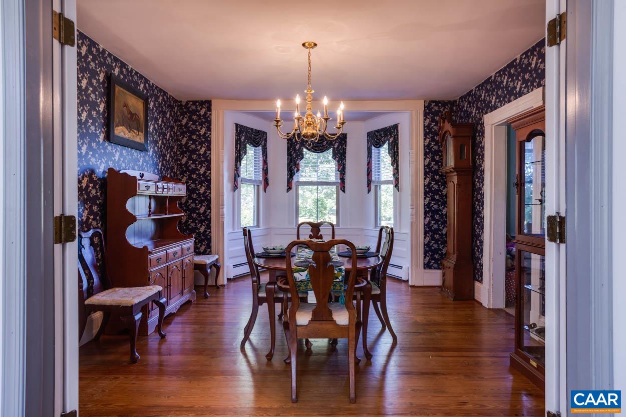 5407 South Blue Ridge Turnpike Rochelle, VA 22738 - Photo 27 of 72 a view of a dining room with furniture window and wooden floor