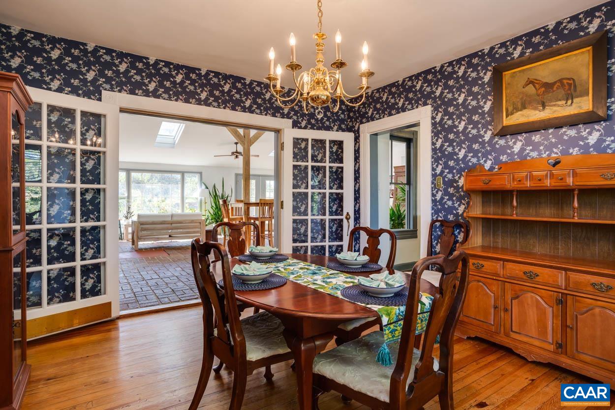 5407 South Blue Ridge Turnpike Rochelle, VA 22738 - Photo 28 of 72 a view of a dining room with furniture and chandelier