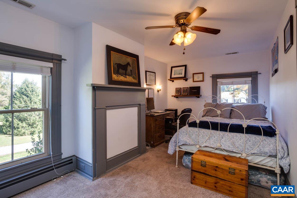 5407 South Blue Ridge Turnpike Rochelle, VA 22738 - Photo 37 of 72 a bedroom with furniture and a window