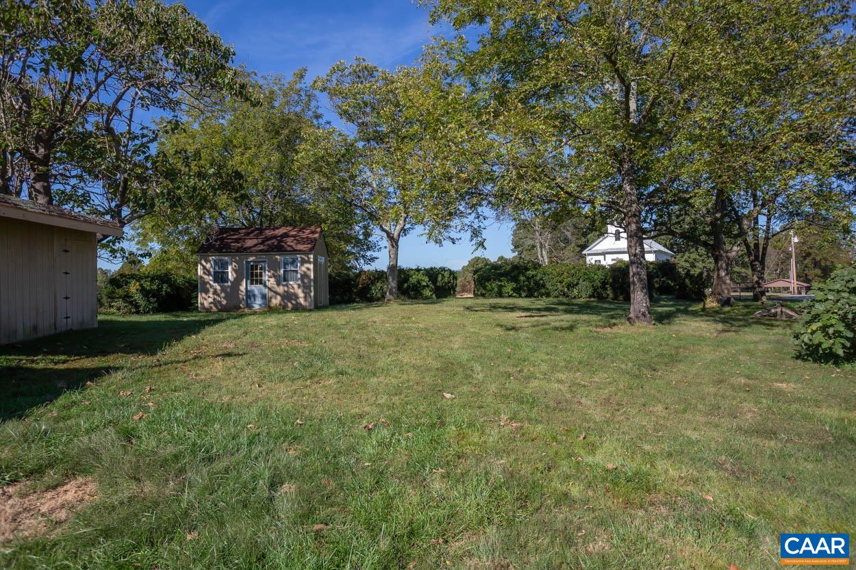 5407 South Blue Ridge Turnpike Rochelle, VA 22738 - Photo 49 of 72 a backyard of a house with lots of green space
