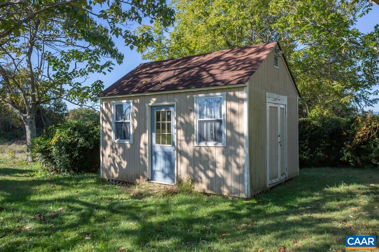 5407 South Blue Ridge Turnpike Rochelle, VA 22738 - Photo 51 of 72 a view of a house with a yard
