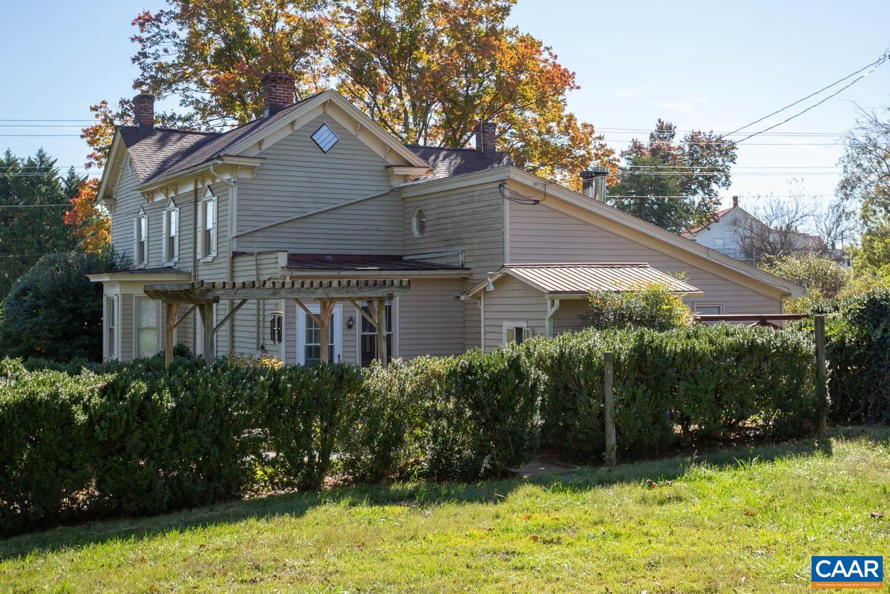 5407 South Blue Ridge Turnpike Rochelle, VA 22738 - Photo 57 of 72 a front view of a house with a yard