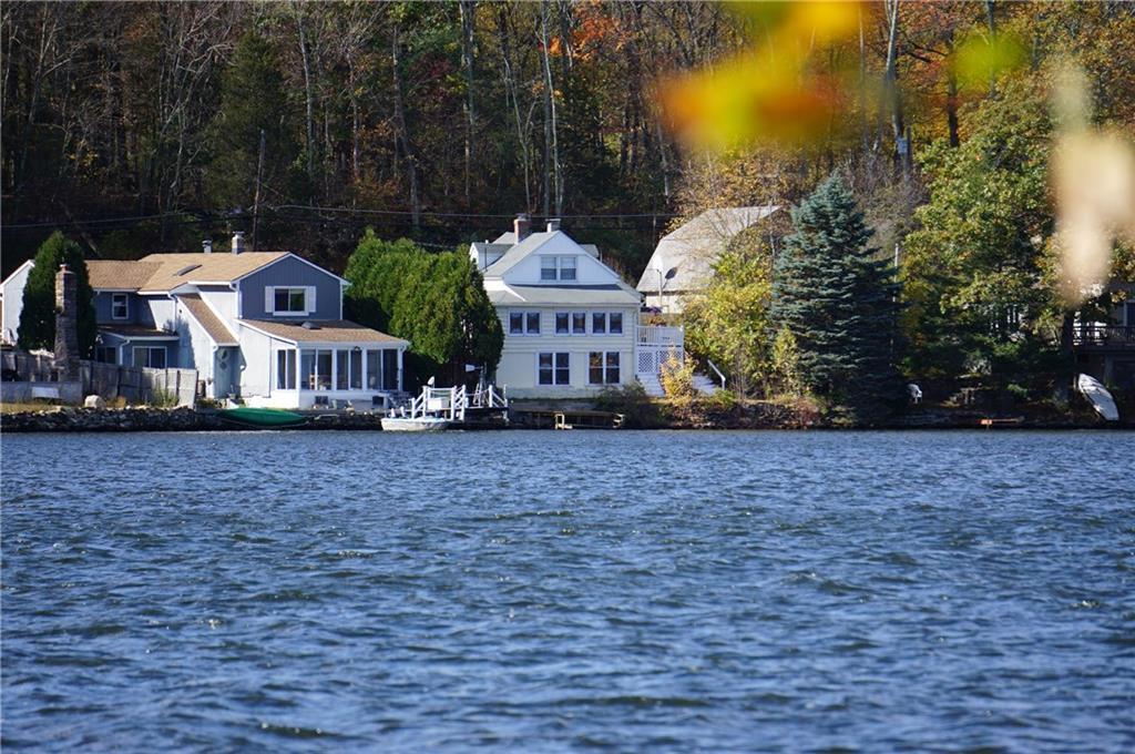 47 Vernon Road Bolton, CT 06043 - Photo 1 of 1 Waterfront home on Bolton Lake is yours for year round enjoyment! The enclosed porch lets you enjoy the views from inside.