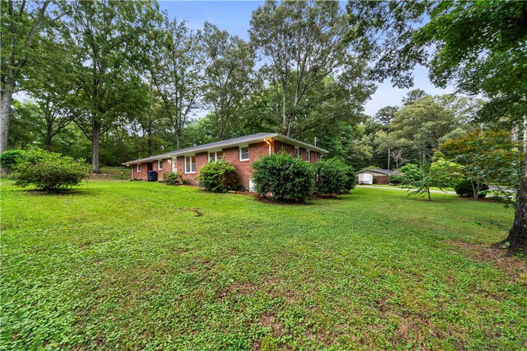 23 East Camelia Road Northeast Rome, GA 30161 - Photo 23 of 27 a house view with garden space