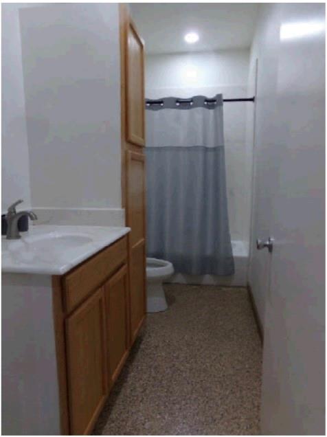 3349 Fm 2652 Graham, TX 76450 - Photo 15 of 22 a bathroom with a sink a toilet and shower