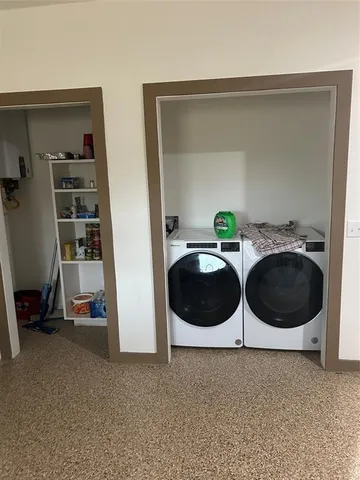 a bedroom with a bed and cabinets