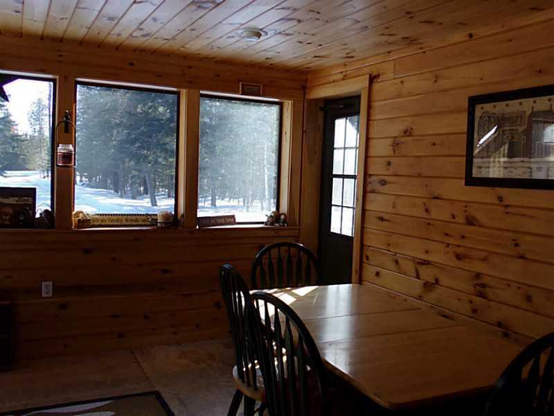 212 Carson Road Woodland, ME 04736 - Photo 10 of 17 Sunroom.