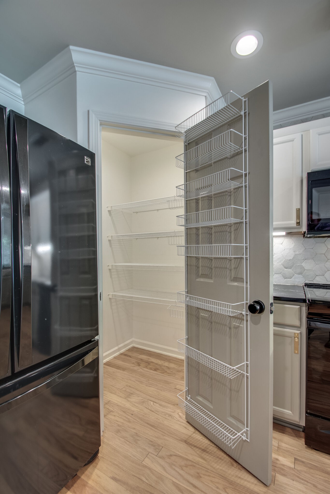 1382 Rural Hill Road, Unit 147 Antioch, TN 37013 - Photo 11 of 35 a view of walk in closet with empty racks