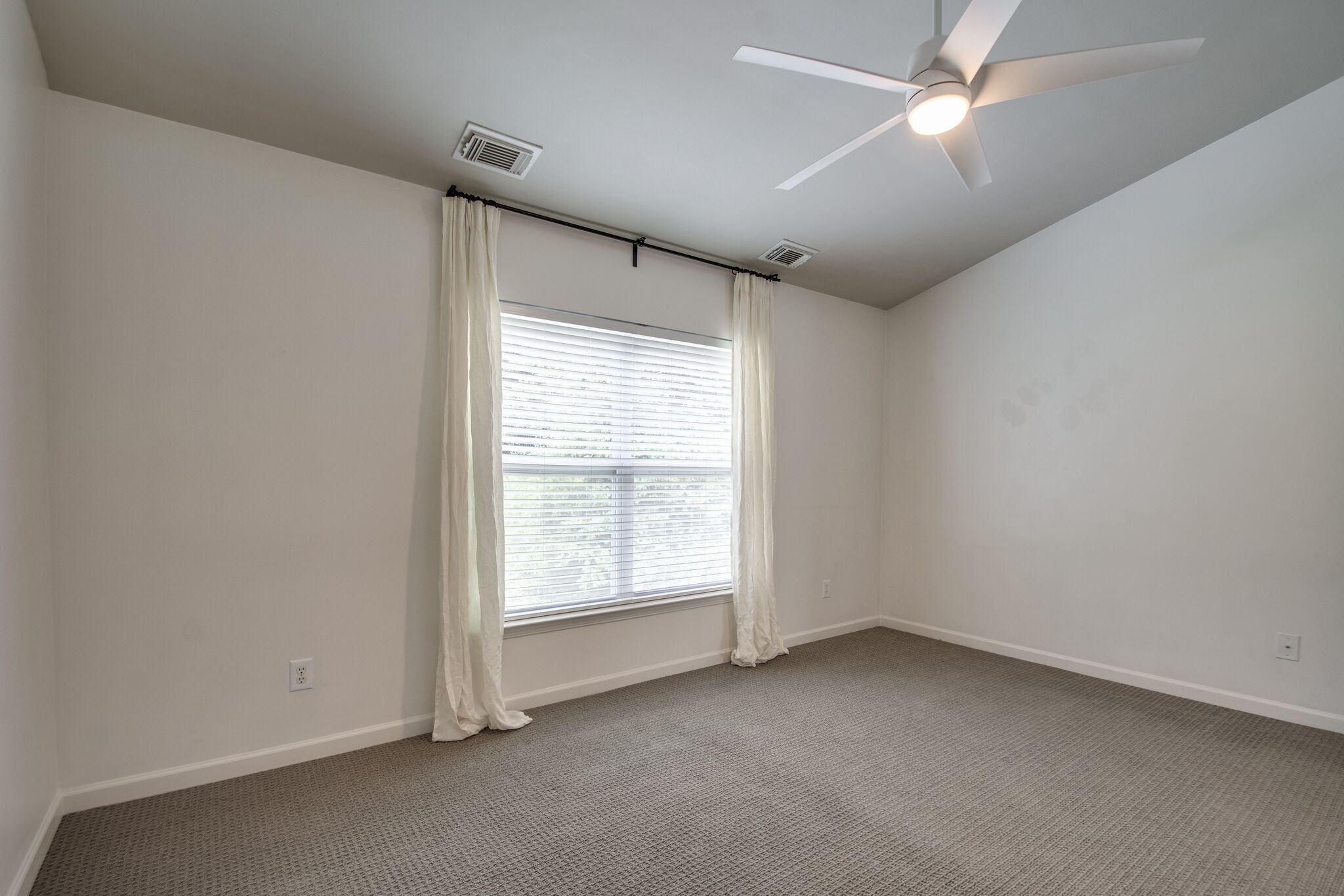 1382 Rural Hill Road, Unit 147 Antioch, TN 37013 - Photo 23 of 35 an empty room with a window and a fan