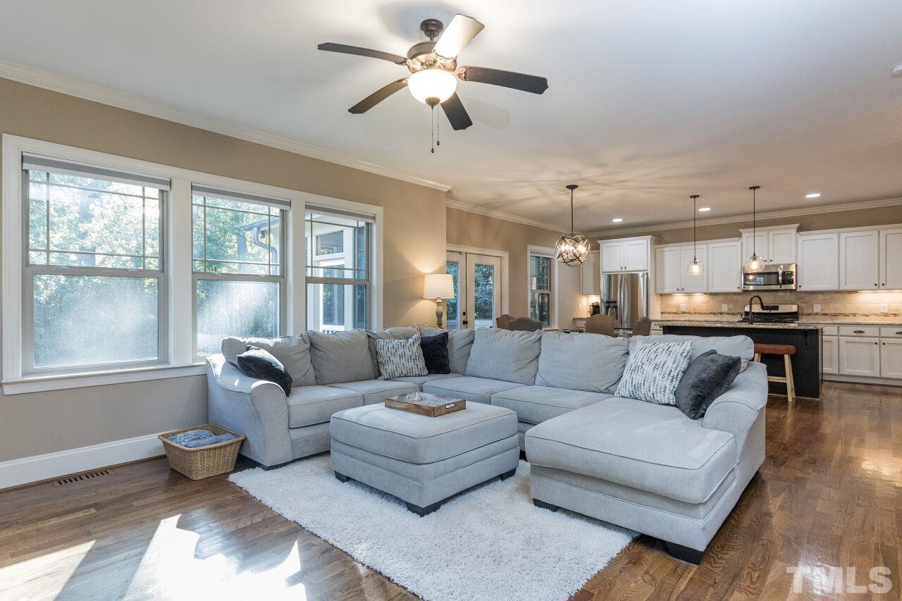 1340 Trinity Road Cary, NC 27513 - Photo 12 of 30 a living room with furniture and a large window