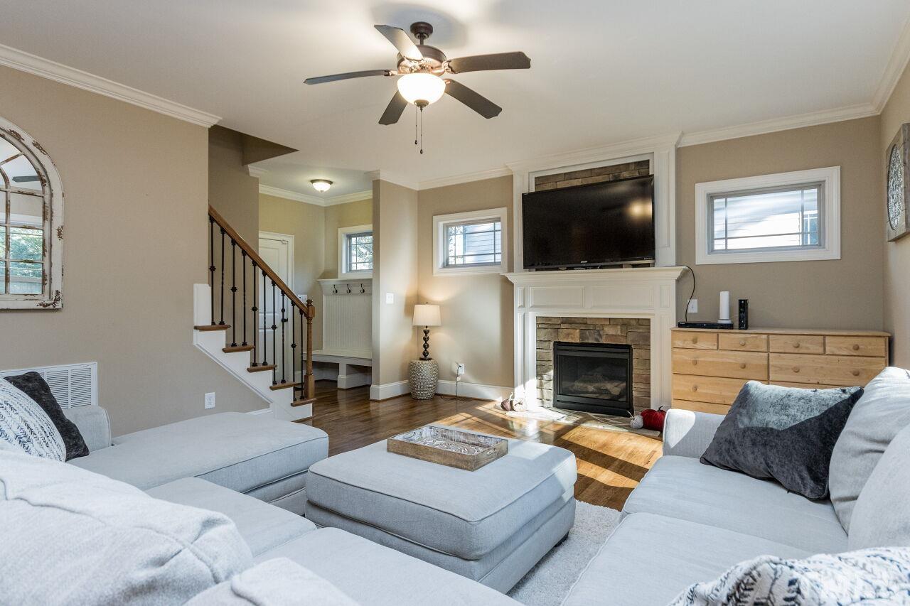 1340 Trinity Road Cary, NC 27513 - Photo 13 of 30 a living room with furniture fireplace and flat screen tv