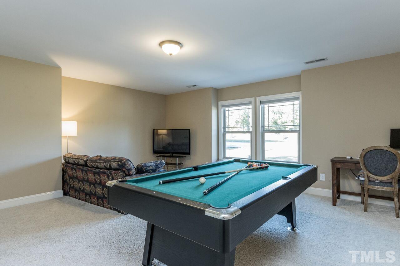 1340 Trinity Road Cary, NC 27513 - Photo 21 of 30 a room with furniture pool table and flat screen tv