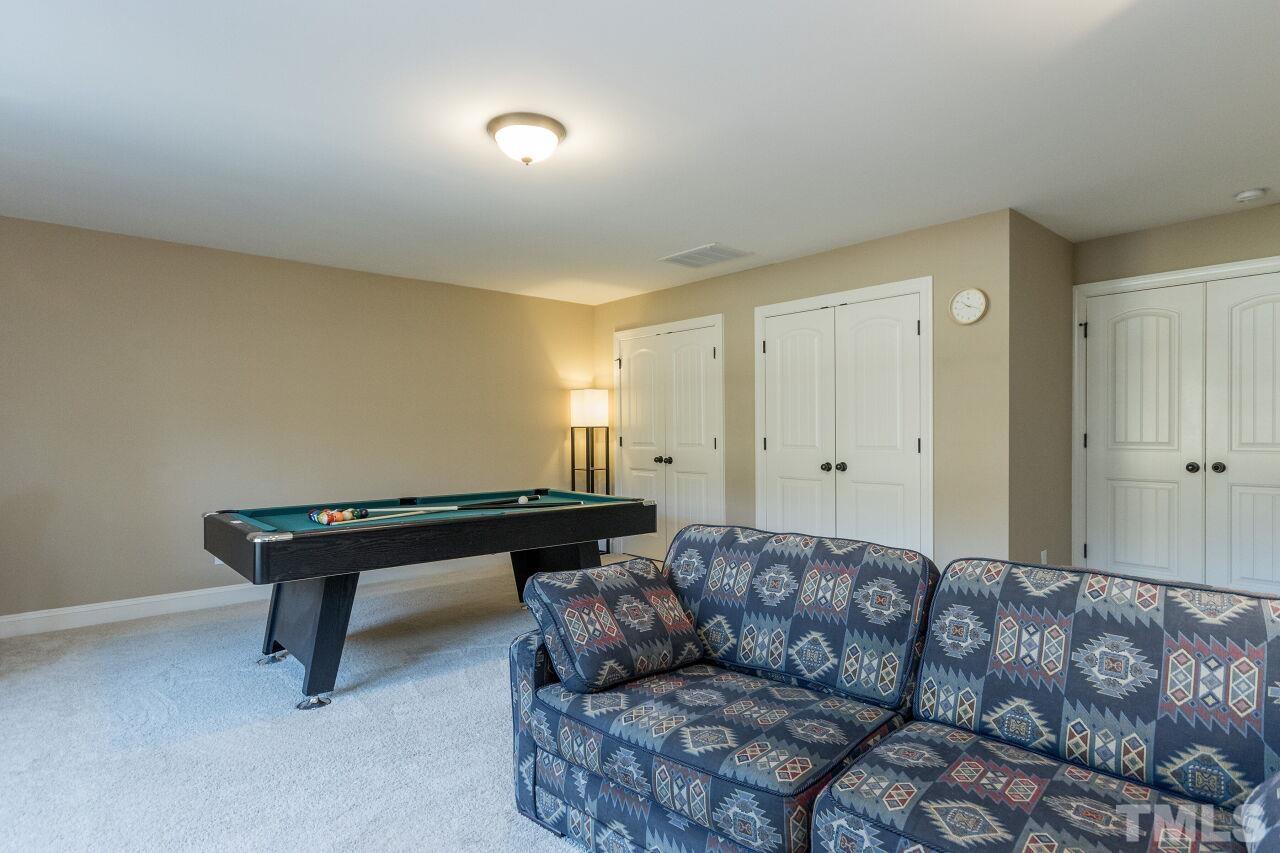 1340 Trinity Road Cary, NC 27513 - Photo 22 of 30 a living room with furniture