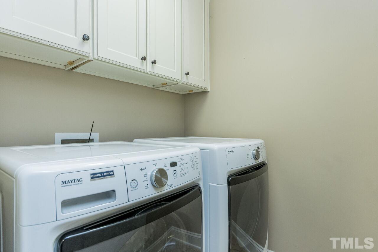 1340 Trinity Road Cary, NC 27513 - Photo 25 of 30 a utility room with dryer and washer