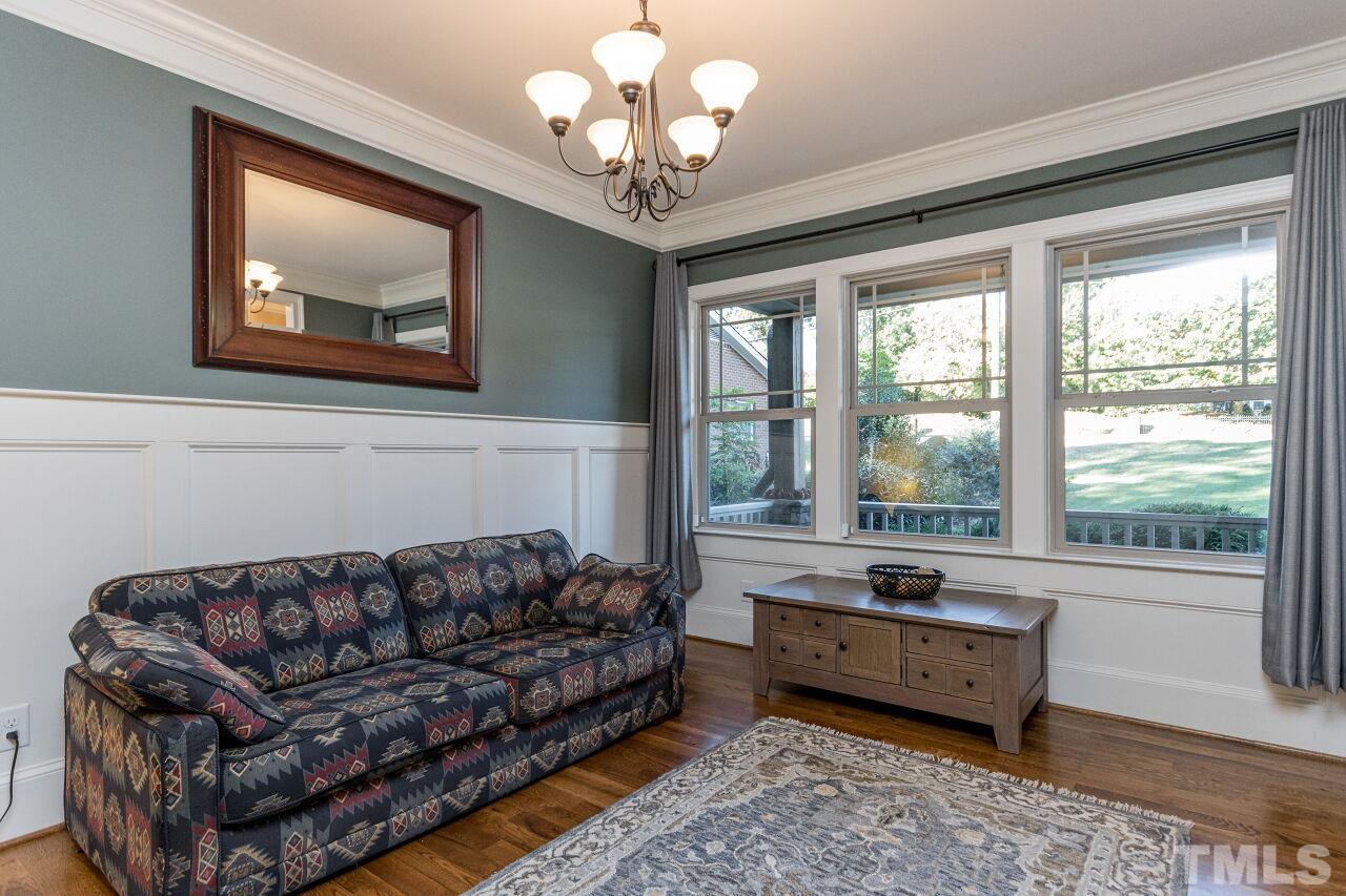 1340 Trinity Road Cary, NC 27513 - Photo 4 of 30 a living room with furniture and a large window