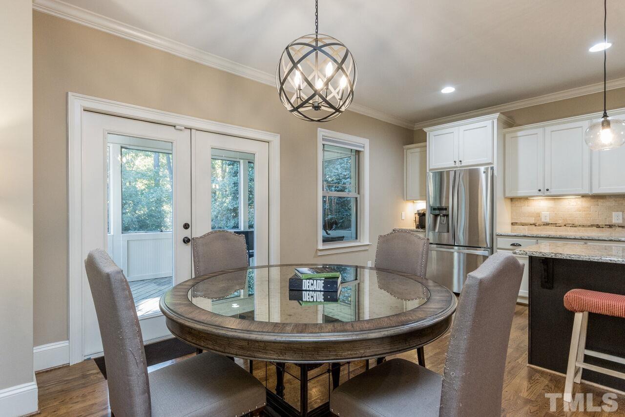 1340 Trinity Road Cary, NC 27513 - Photo 9 of 30 a view of a dining room with furniture window and outside view