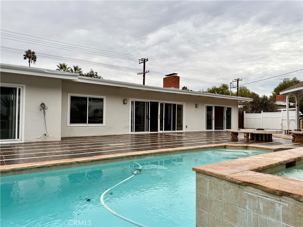 24204 Calvert Street Woodland Hills, CA 91367 - Photo 11 of 70 a front view of house with yard