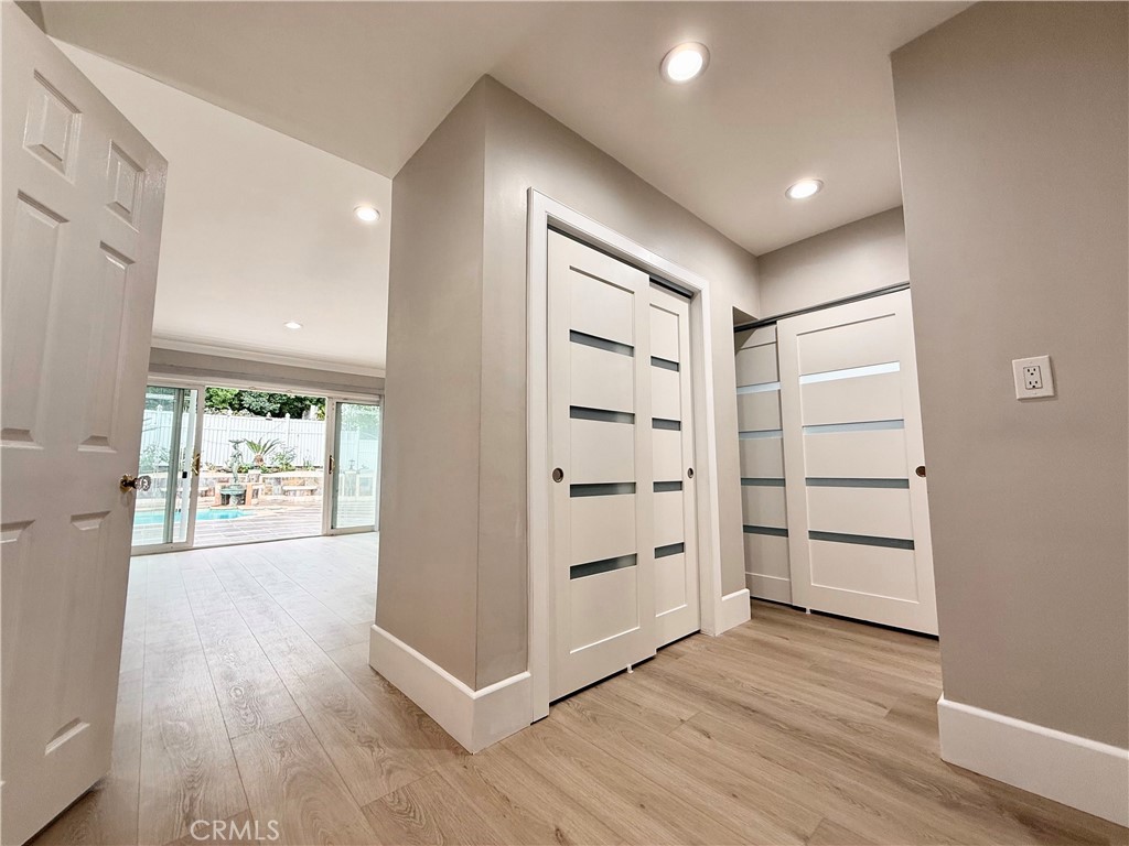 24204 Calvert Street Woodland Hills, CA 91367 - Photo 23 of 70 wooden floor in an empty room with a window