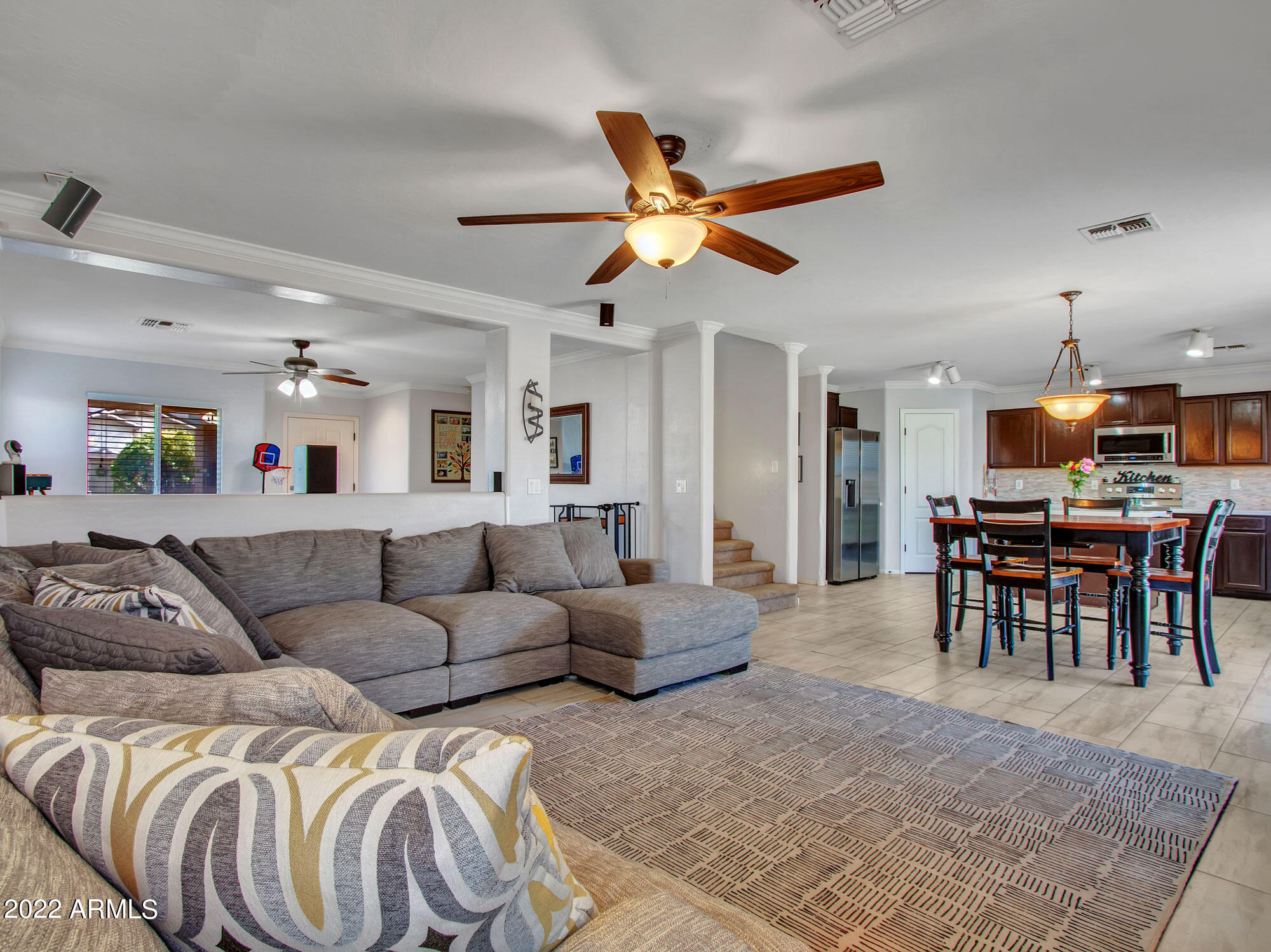 11645 West Mountain View Road Youngtown, AZ 85363 - Photo 17 of 45 a living room with furniture and a large window