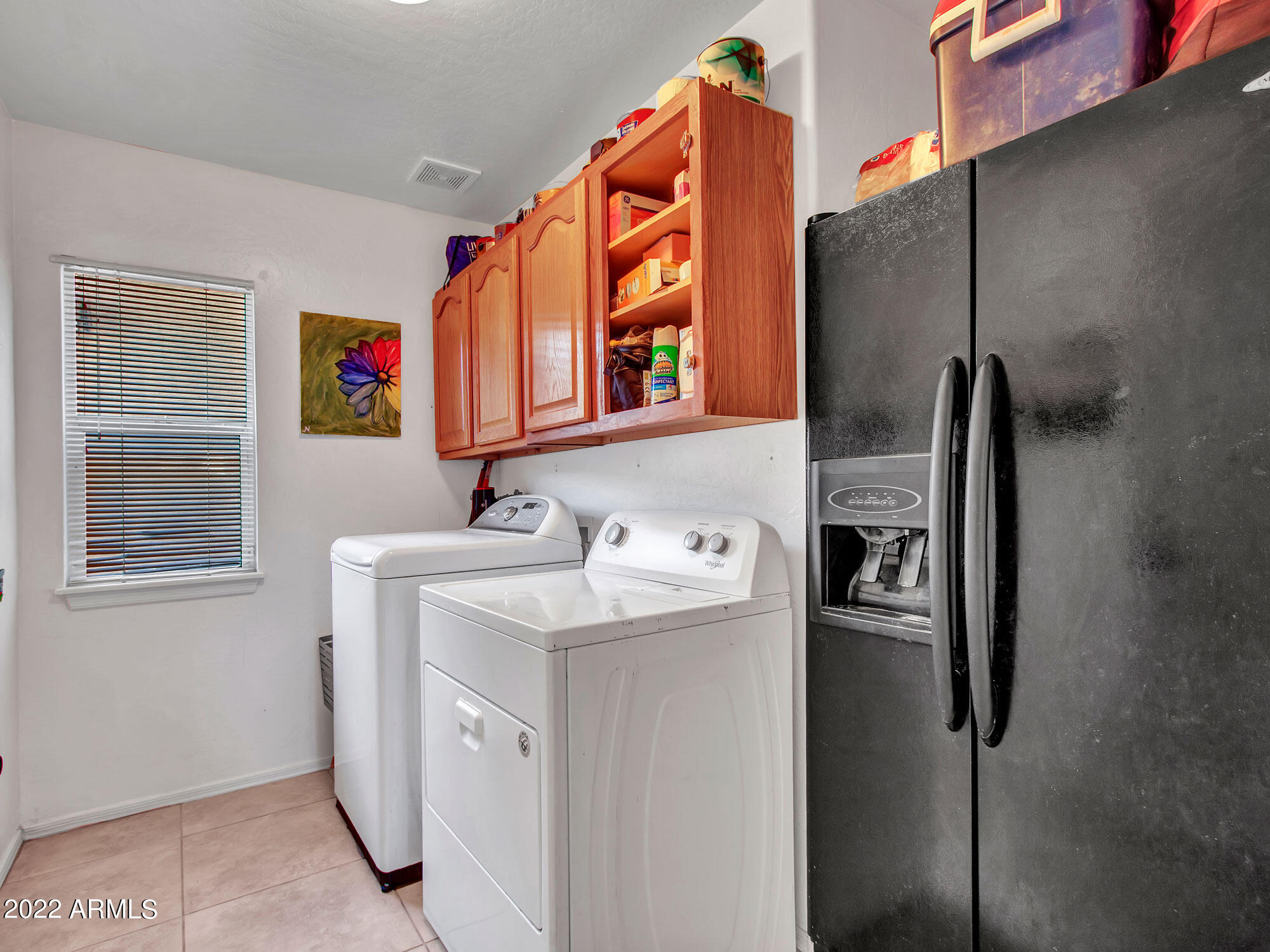 11645 West Mountain View Road Youngtown, AZ 85363 - Photo 20 of 45 a utility room with dryer and washer