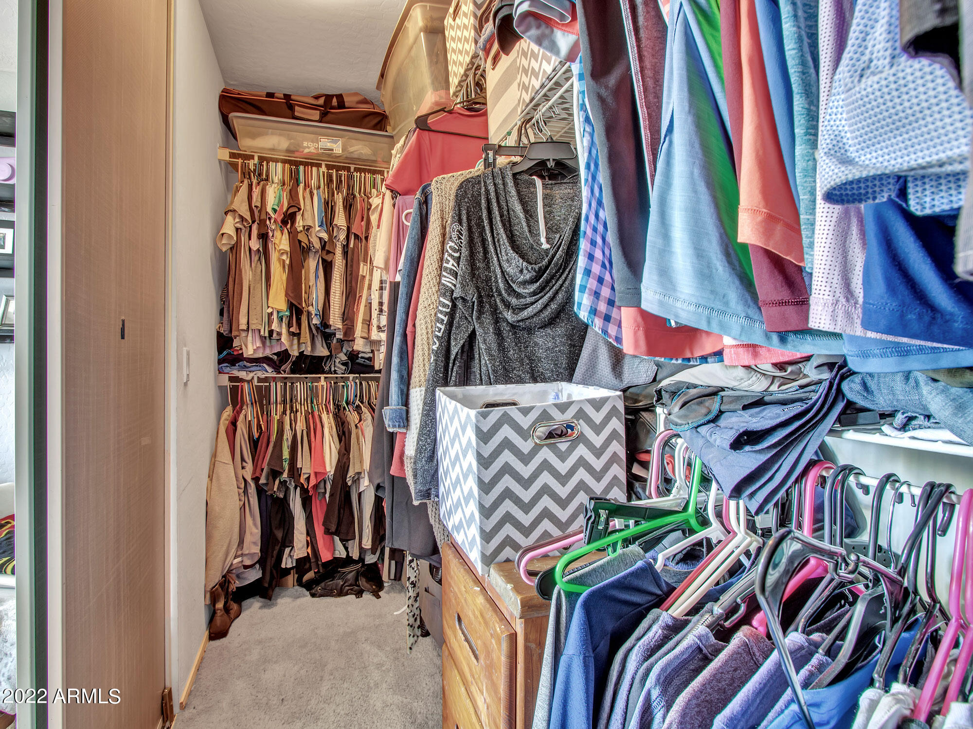 11645 West Mountain View Road Youngtown, AZ 85363 - Photo 27 of 45 a view of walk in closet with clothes