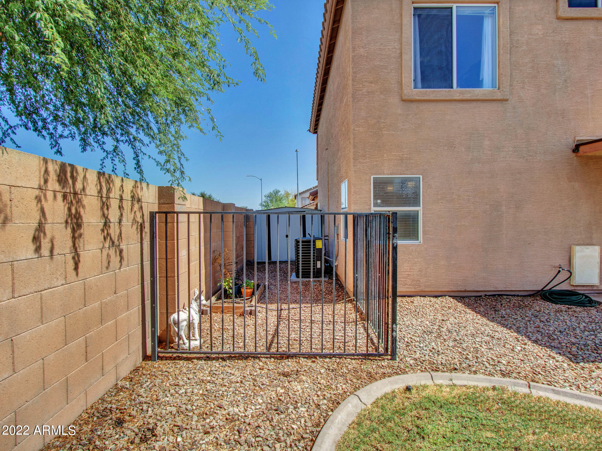 11645 West Mountain View Road Youngtown, AZ 85363 - Photo 37 of 45 a view of balcony with wooden floor and fence