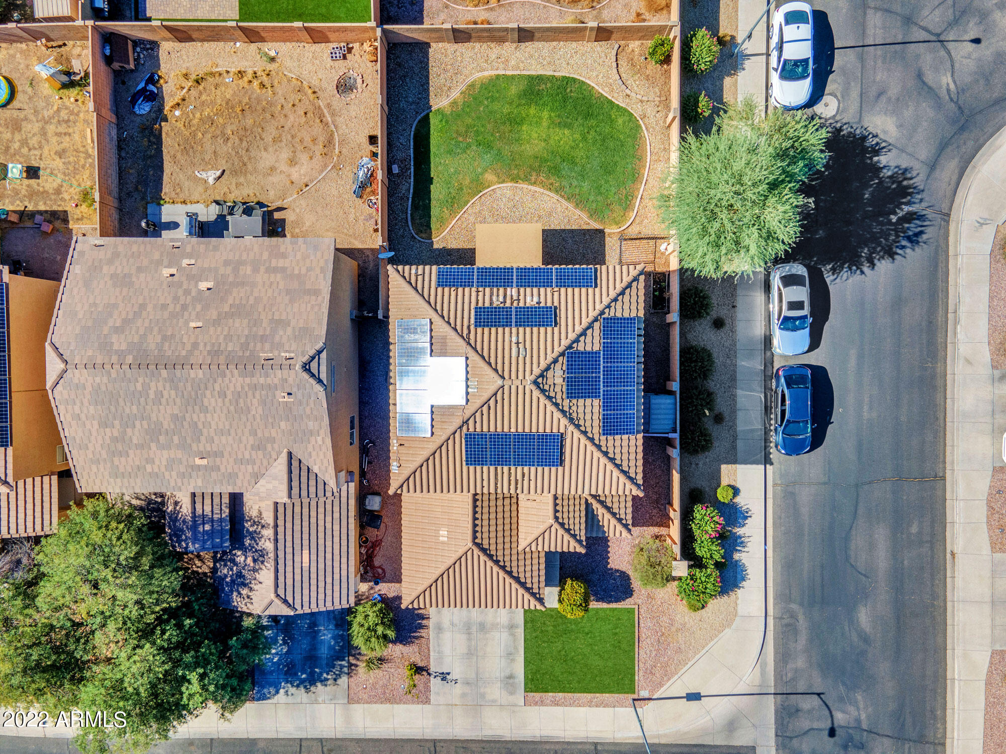 11645 West Mountain View Road Youngtown, AZ 85363 - Photo 41 of 45 a aerial view of a house with a yard and potted plants