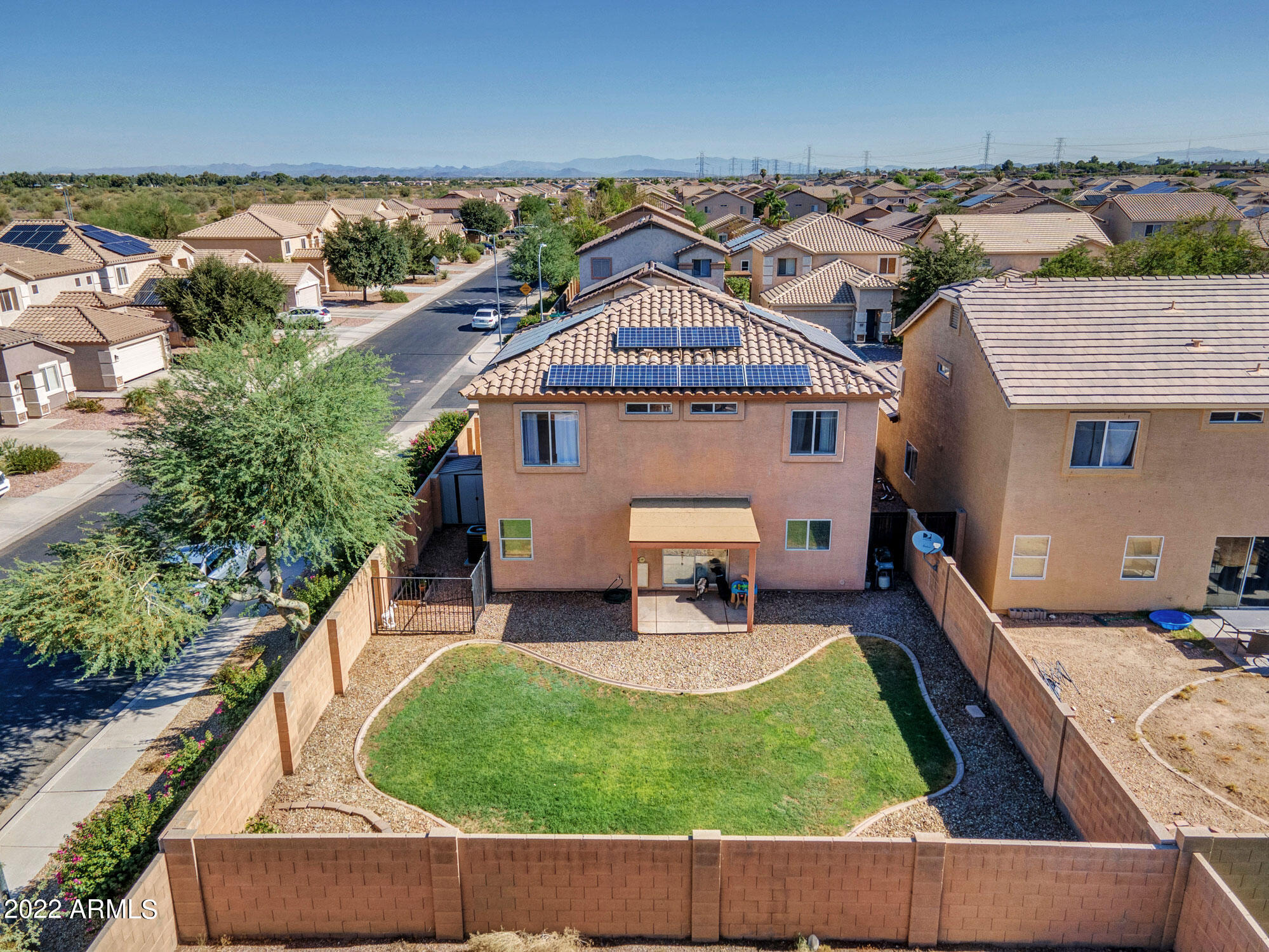 11645 West Mountain View Road Youngtown, AZ 85363 - Photo 5 of 45 an aerial view of a house with swimming pool garden and patio