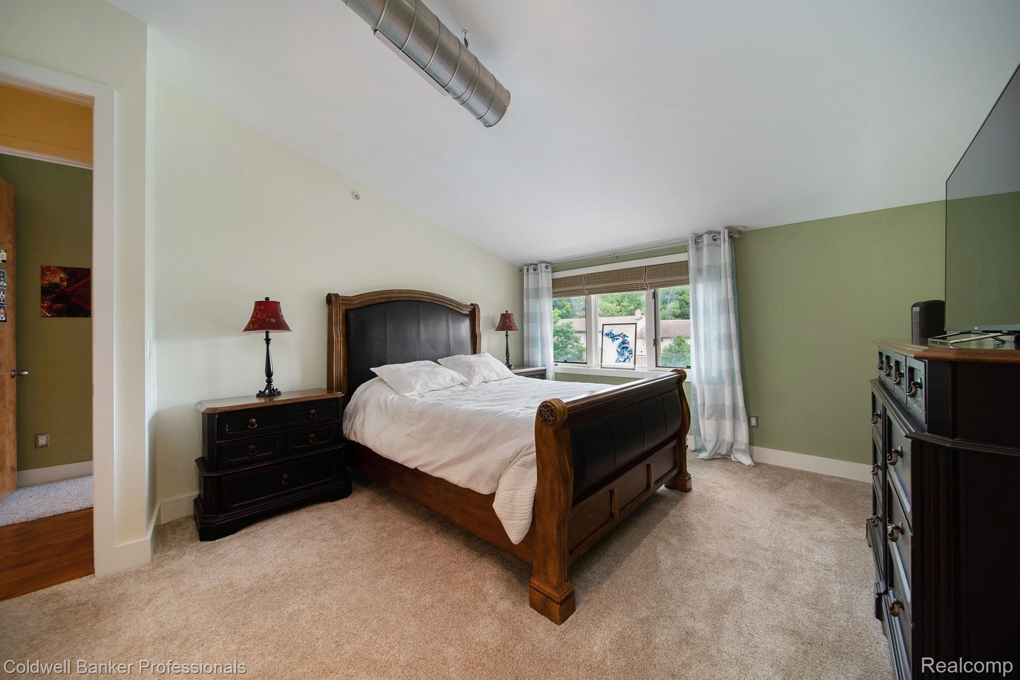 714 North Main Street, Unit 312 Rochester, MI 48307 - Photo 12 of 25 master bedroom