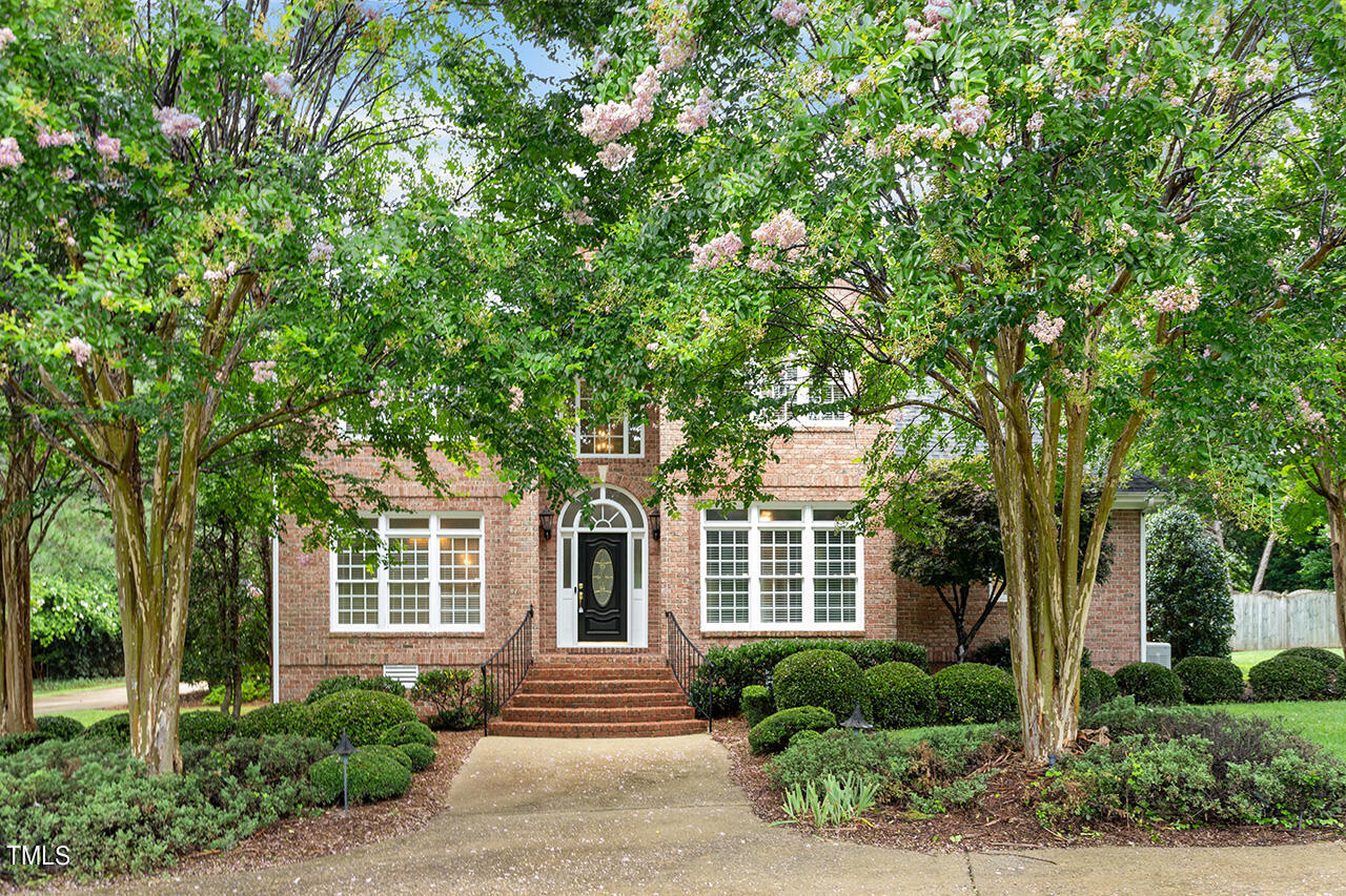 909 Rockfall Court Raleigh, NC 27614 - Photo 1 of 38 front view of a house with a tree
