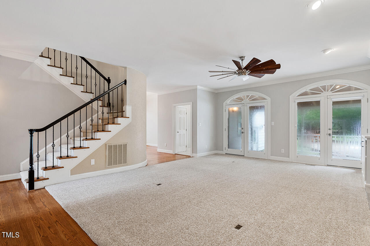 909 Rockfall Court Raleigh, NC 27614 - Photo 13 of 38 a view of an entryway with a livingroom