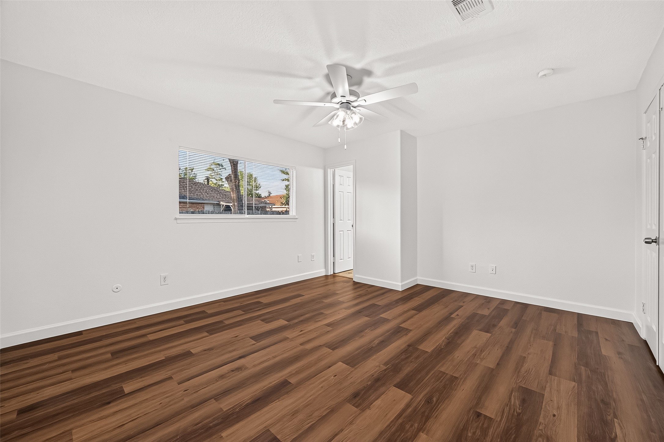 9322 Magnolia Ridge Drive Houston, TX 77070 - Photo 11 of 16 Corner view of primary. Primary has an en-suite bathroom.
