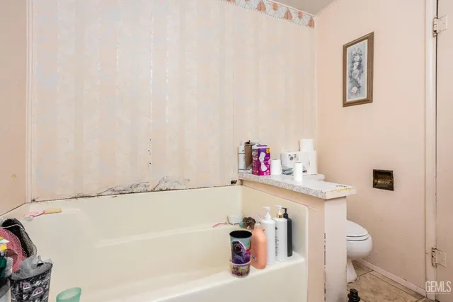 a bathroom with a sink and a toilet