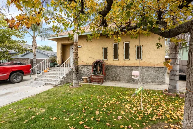 a view of a house with a patio
